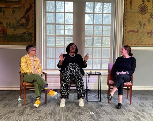 Animated discussion among the panelists at the New Haven Free Public Library
