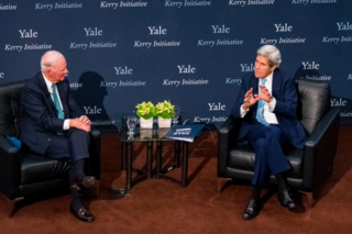 John Kerry speaks on a panel