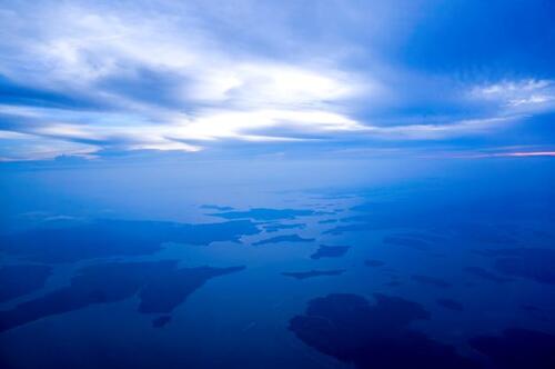 Photo: Tim Reinhart, Boeing An archipelago from the air at dusk